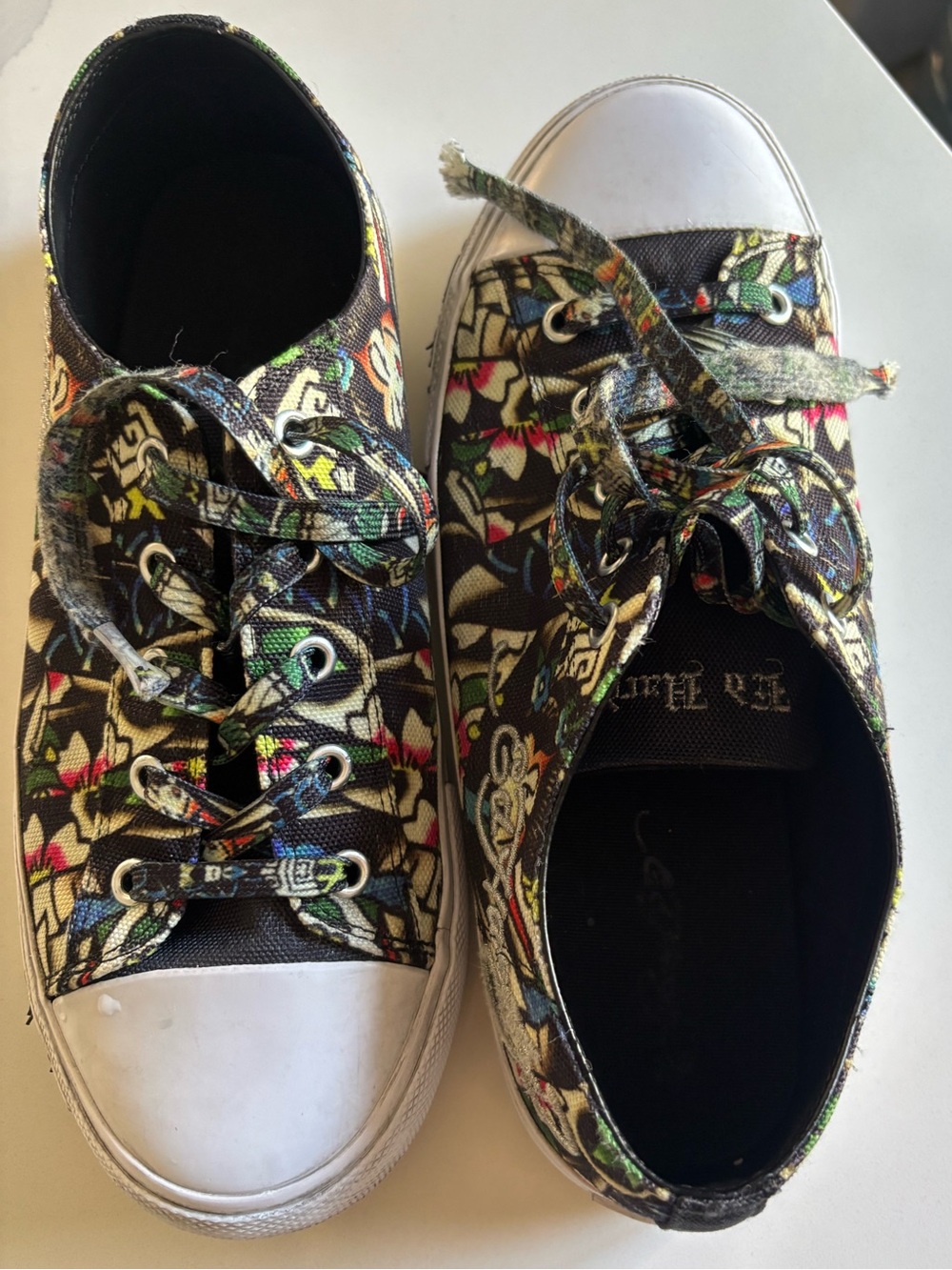 Ed Hardy All-over black canvas sneakers with colorful Geisha and tattoo graphic
